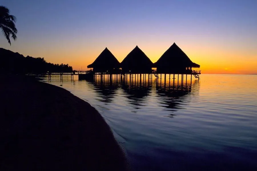 Maldives and French Polynesia — overwater bungalows and crystal lagoons